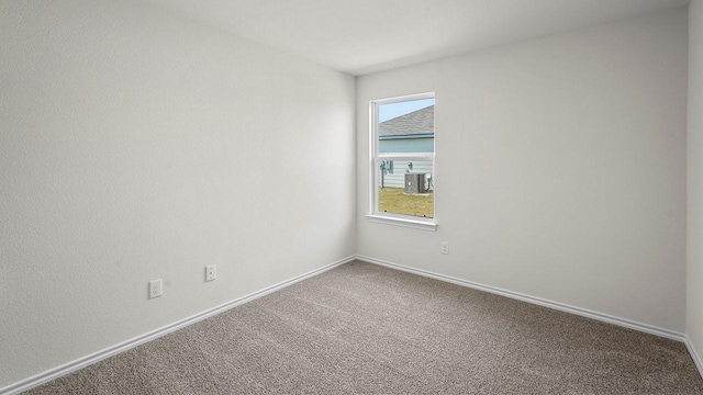 441 Drake Dr, Ferris, TX 75125 - carpeted empty room featuring baseboards