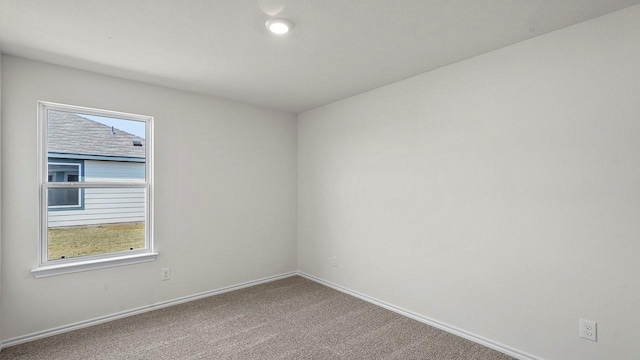 441 Drake Dr, Ferris, TX 75125 - unfurnished room with baseboards and carpet floors