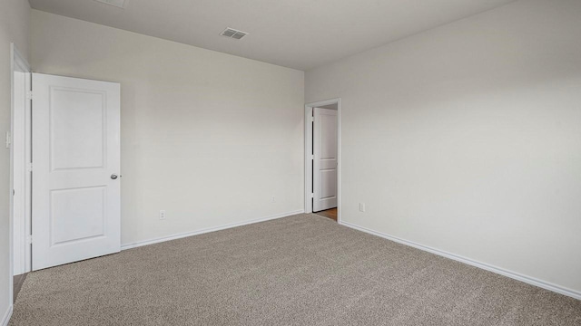 441 Drake Dr, Ferris, TX 75125 - carpeted empty room featuring baseboards