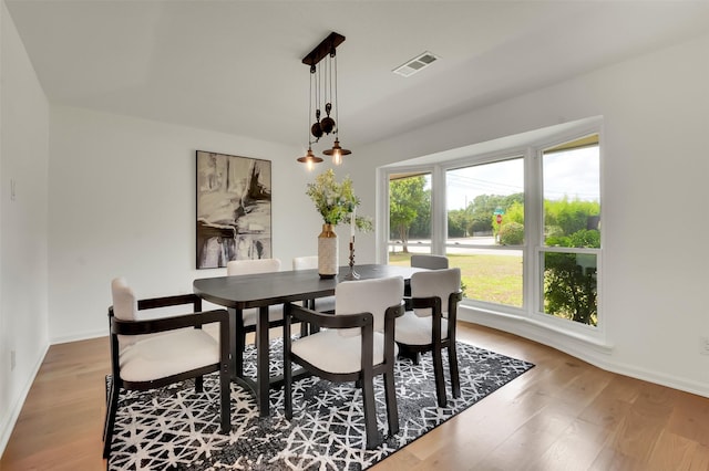 6910 Midcrest Dr, Dallas, TX 75254 - dining room featuring wood finished floors and baseboards