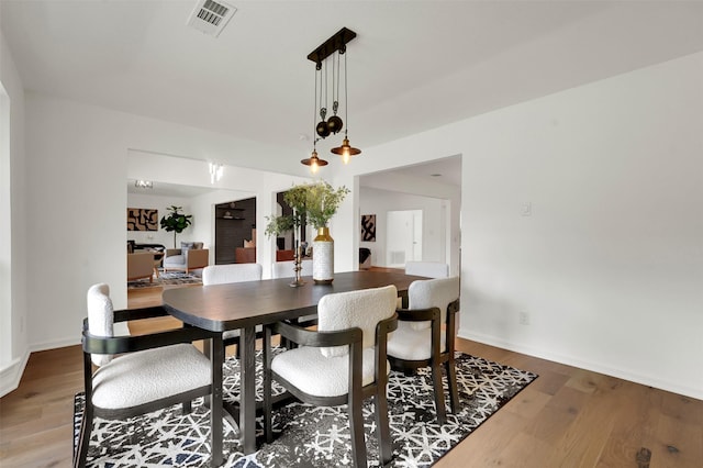 6910 Midcrest Dr, Dallas, TX 75254 - dining room featuring wood finished floors