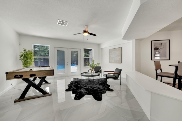 6910 Midcrest Dr, Dallas, TX 75254 - dining area with french doors and ceiling fan