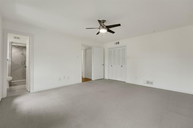 6910 Midcrest Dr, Dallas, TX 75254 - unfurnished bedroom with carpet floors, a closet, ensuite bath, and a ceiling fan