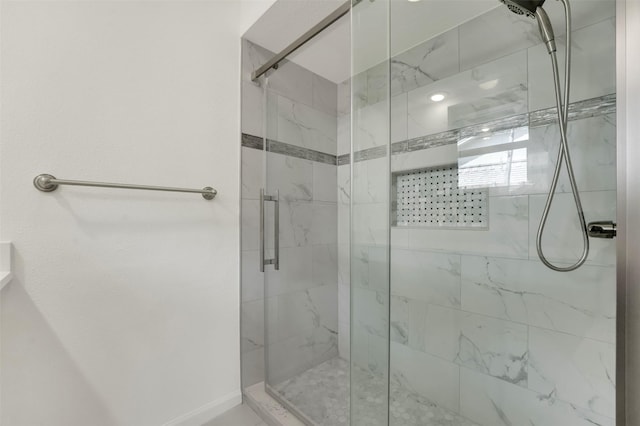6910 Midcrest Dr, Dallas, TX 75254 - full bathroom featuring a marble finish shower and baseboards
