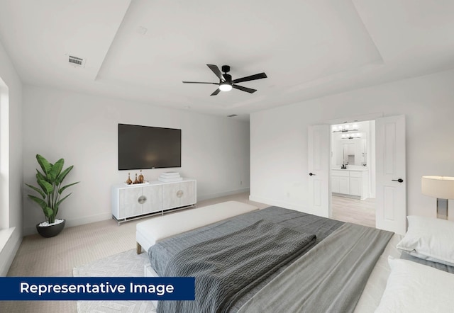 2113 Rockhopper Ct, Mansfield, TX 76063 - bedroom featuring light colored carpet, a chandelier, a raised ceiling, and ceiling fan