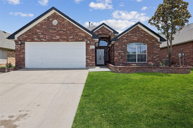6945 Stockton Dr, Fort Worth, TX 76132 - ranch-style home featuring a front yard, concrete driveway, brick siding, and a garage