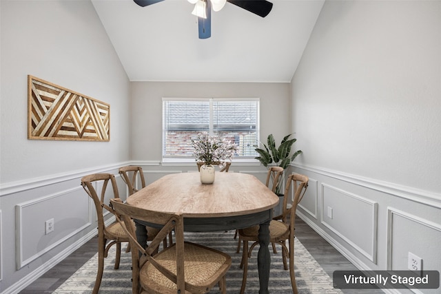 6945 Stockton Dr, Fort Worth, TX 76132 - dining area with vaulted ceiling, dark wood finished floors, wainscoting, ceiling fan, and a decorative wall