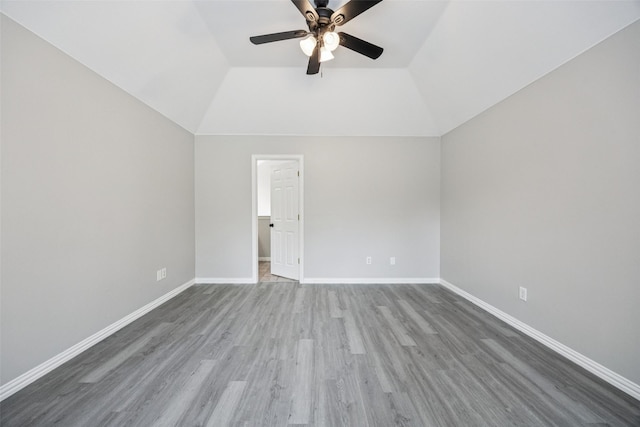 6945 Stockton Dr, Fort Worth, TX 76132 - empty room with ceiling fan, vaulted ceiling, and wood finished floors