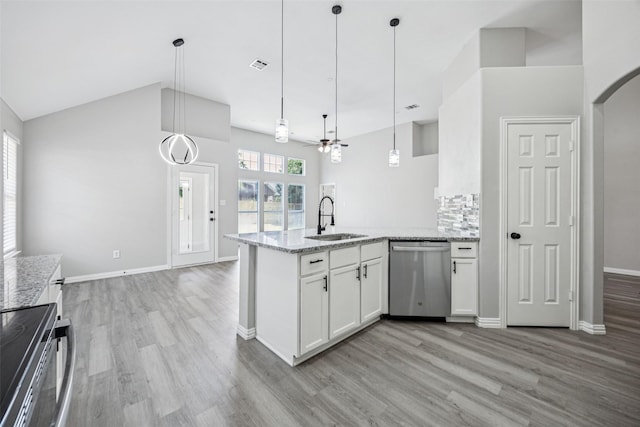 6945 Stockton Dr, Fort Worth, TX 76132 - kitchen featuring dishwasher, electric range, light wood-style floors, a ceiling fan, and lofted ceiling