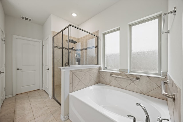 2025 Meliana Dr, Little Elm, TX 75068 - full bathroom with a bath, a stall shower, tile patterned flooring, and recessed lighting
