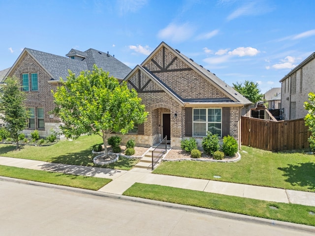 2025 Meliana Dr, Little Elm, TX 75068 - view of front of home with brick siding and roof with shingles