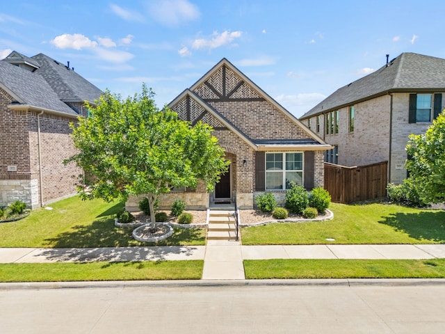 2025 Meliana Dr, Little Elm, TX 75068 - french country home featuring brick siding