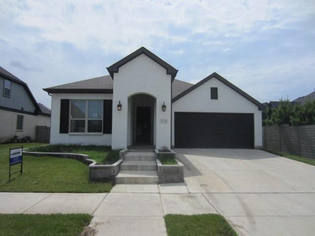 1813 Terrace Way, Argyle, TX 76226 - view of front of house featuring a garage, driveway, and stucco siding