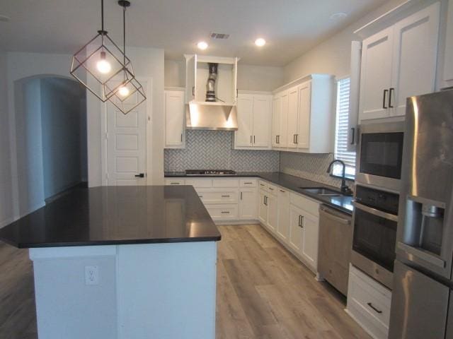 1813 Terrace Way, Argyle, TX 76226 - kitchen with appliances with stainless steel finishes, dark countertops, white cabinets, and recessed lighting
