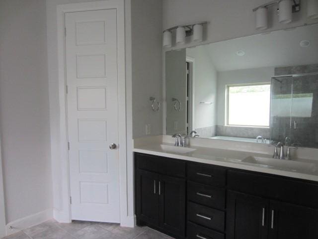 1813 Terrace Way, Argyle, TX 76226 - bathroom featuring a stall shower, a bath, double vanity, and tile patterned flooring