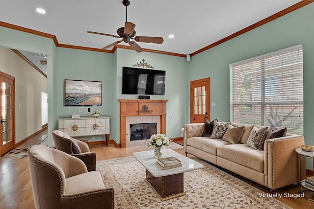 9664 Norris Ferry Rd, Shreveport, LA 71106 - living room with healthy amount of natural light, wood finished floors, a ceiling fan, crown molding, and recessed lighting