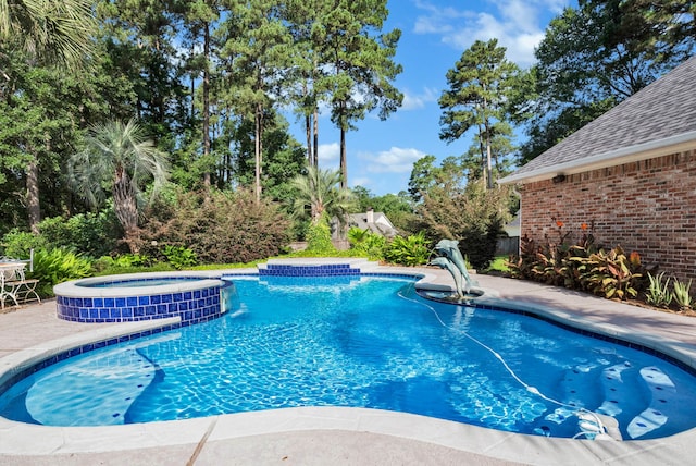 9664 Norris Ferry Rd, Shreveport, LA 71106 - view of swimming pool with a pool with connected hot tub and a patio area