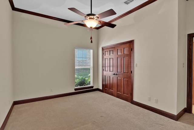 9664 Norris Ferry Rd, Shreveport, LA 71106 - unfurnished bedroom featuring carpet flooring, crown molding, and a ceiling fan