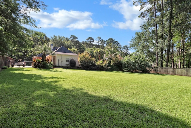 9664 Norris Ferry Rd, Shreveport, LA 71106 - fenced backyard with view of wooded area