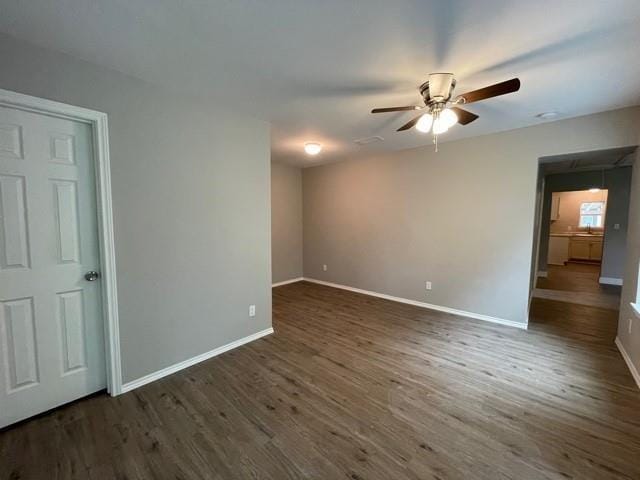 4601 Cox St, Sherman, TX 75090 - unfurnished room with a ceiling fan and dark wood finished floors