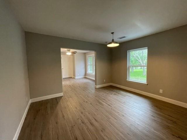 4601 Cox St, Sherman, TX 75090 - empty room featuring wood finished floors and baseboards
