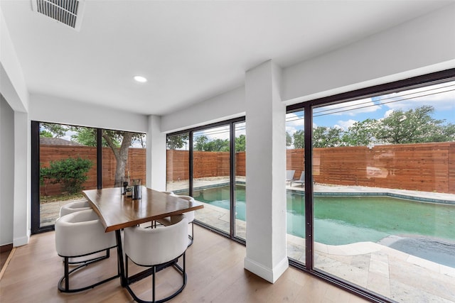12211 Quincy Ln, Dallas, TX 75230 - sunroom / solarium featuring plenty of natural light