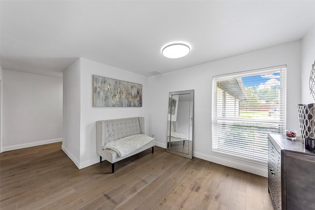 12211 Quincy Ln, Dallas, TX 75230 - living area with wood finished floors and baseboards