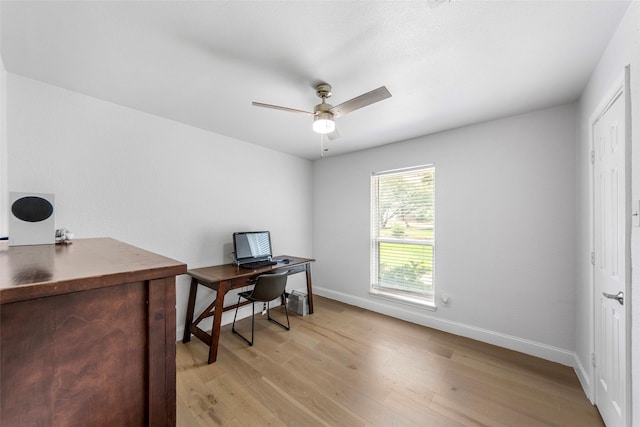 12211 Quincy Ln, Dallas, TX 75230 - home office featuring light wood-style flooring and ceiling fan