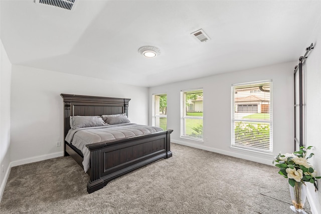 12211 Quincy Ln, Dallas, TX 75230 - bedroom with carpet floors and baseboards