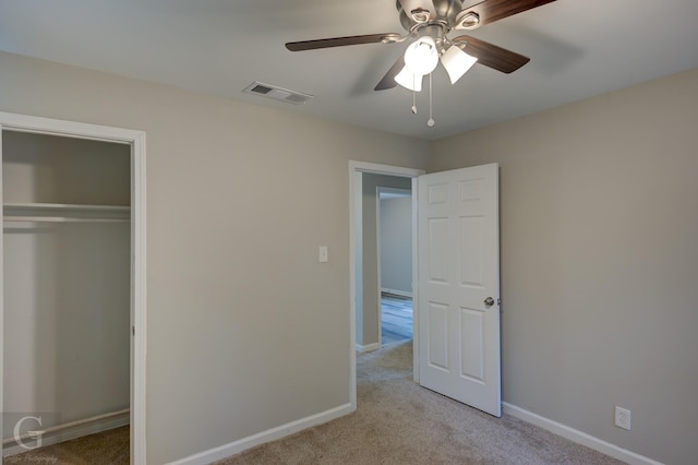 6312 Canal Blvd, Shreveport, LA 71108 - unfurnished bedroom with light carpet, a closet, and ceiling fan