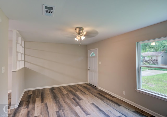 6312 Canal Blvd, Shreveport, LA 71108 - unfurnished room with a ceiling fan, wood finished floors, and plenty of natural light