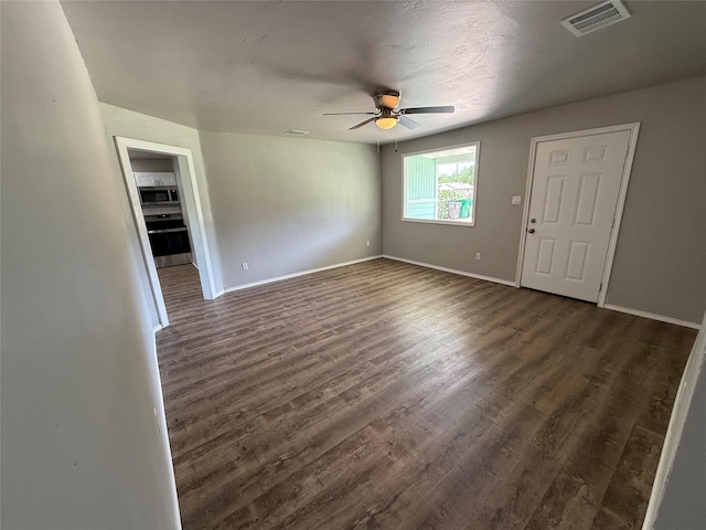 5506 Urbanview St, Sansom Park, TX 76114 - unfurnished room featuring ceiling fan and dark wood-style floors