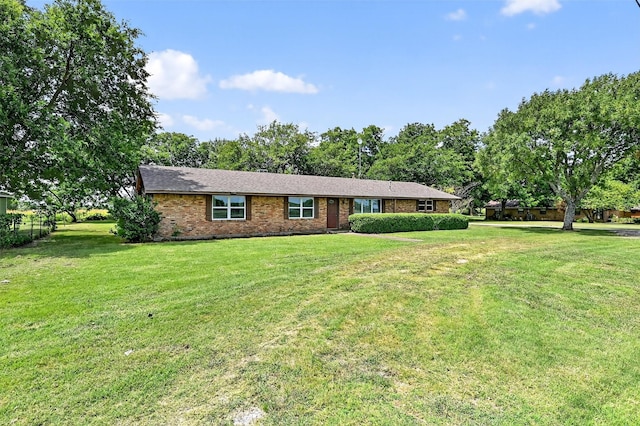 12906 Fm 902, Dorchester, TX 75459 - ranch-style house with brick siding and a front yard