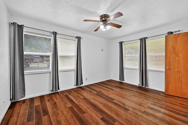 12906 Fm 902, Dorchester, TX 75459 - unfurnished room with wood finished floors, ceiling fan, and a textured ceiling