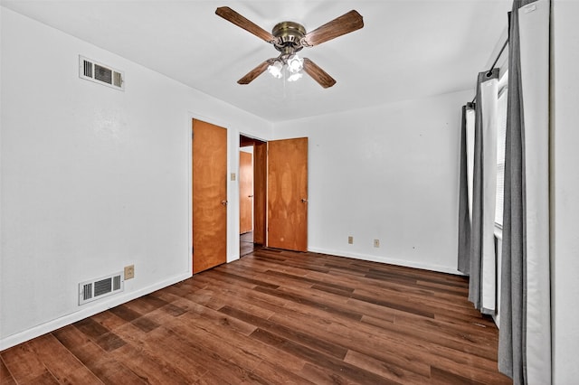 12906 Fm 902, Dorchester, TX 75459 - unfurnished bedroom with dark wood-type flooring and a ceiling fan