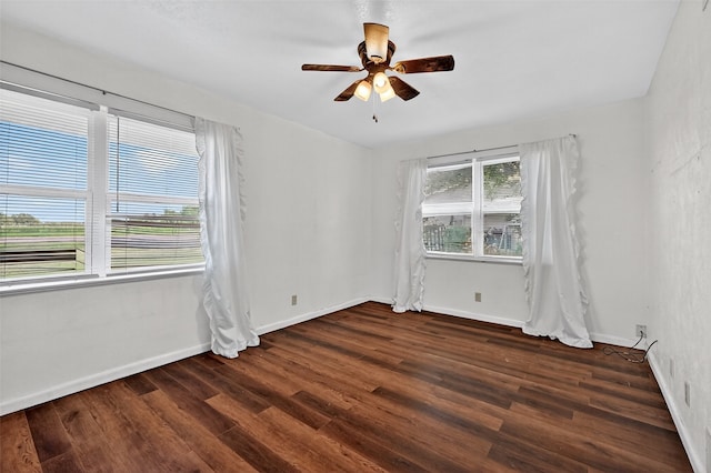12906 Fm 902, Dorchester, TX 75459 - unfurnished room with dark wood-style floors and a ceiling fan