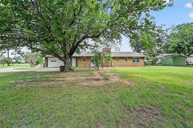 12906 Fm 902, Dorchester, TX 75459 - view of front of house with a garage, a front lawn, and brick siding