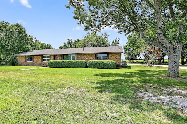 12906 Fm 902, Dorchester, TX 75459 - ranch-style house with a front yard and brick siding