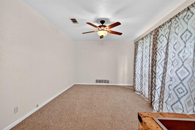 12906 Fm 902, Dorchester, TX 75459 - carpeted empty room featuring a ceiling fan and baseboards