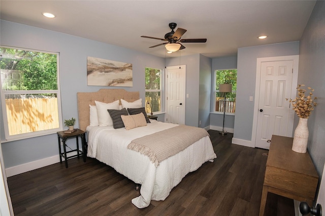 401 Miller St, Bowie, TX 76230 - bedroom with multiple windows, dark wood-style flooring, recessed lighting, and a ceiling fan