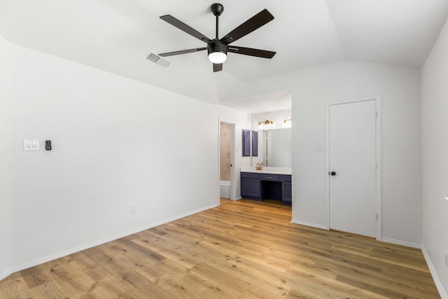 6325 Brookhaven Trl, Fort Worth, TX 76133 - unfurnished bedroom featuring vaulted ceiling, light wood-style floors, connected bathroom, and ceiling fan