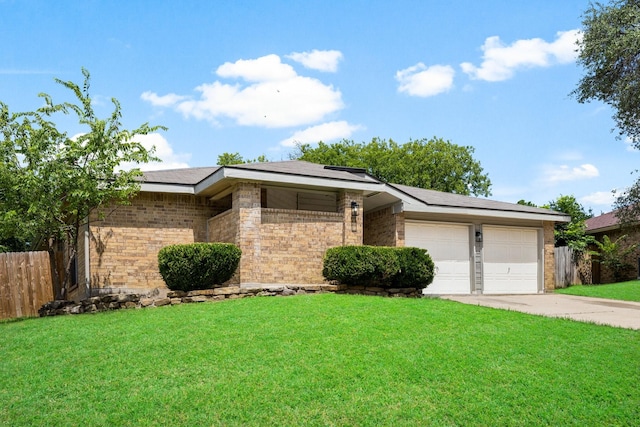 6325 Brookhaven Trl, Fort Worth, TX 76133 - view of front of home with a garage, driveway, and brick siding