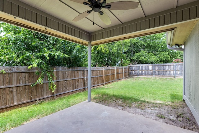 6325 Brookhaven Trl, Fort Worth, TX 76133 - fenced backyard with ceiling fan and a patio