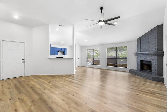 6325 Brookhaven Trl, Fort Worth, TX 76133 - unfurnished living room featuring vaulted ceiling, ceiling fan, a fireplace, light wood-style flooring, and recessed lighting