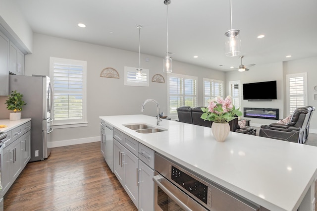 770 N Plano Rd Unit 202, Richardson, TX 75081 - kitchen featuring open floor plan, light countertops, healthy amount of natural light, and recessed lighting