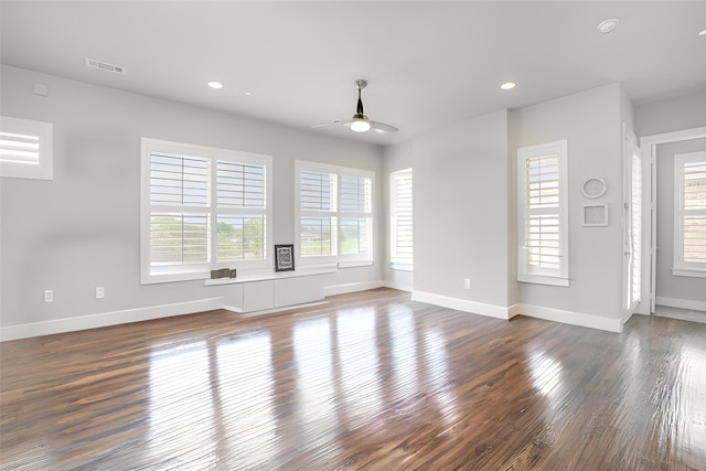770 N Plano Rd Unit 202, Richardson, TX 75081 - unfurnished living room featuring plenty of natural light, ceiling fan, dark wood finished floors, and recessed lighting