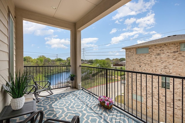 770 N Plano Rd Unit 202, Richardson, TX 75081 - balcony with a water view