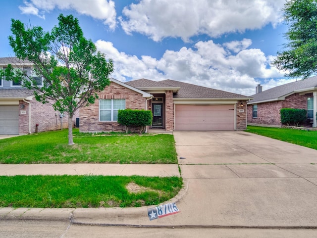 8705 Autumn Creek Trl, Fort Worth, TX 76134 - single story home with concrete driveway, an attached garage, a front lawn, and brick siding