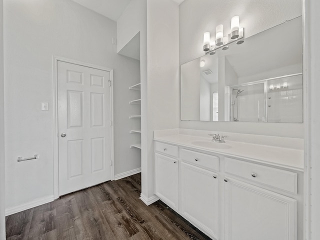 8705 Autumn Creek Trl, Fort Worth, TX 76134 - bathroom with a stall shower, vanity, and wood finished floors