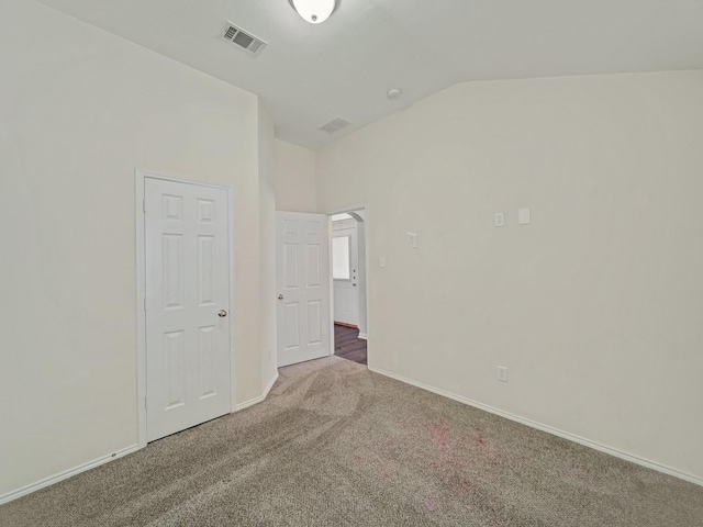 8705 Autumn Creek Trl, Fort Worth, TX 76134 - carpeted empty room featuring vaulted ceiling and baseboards